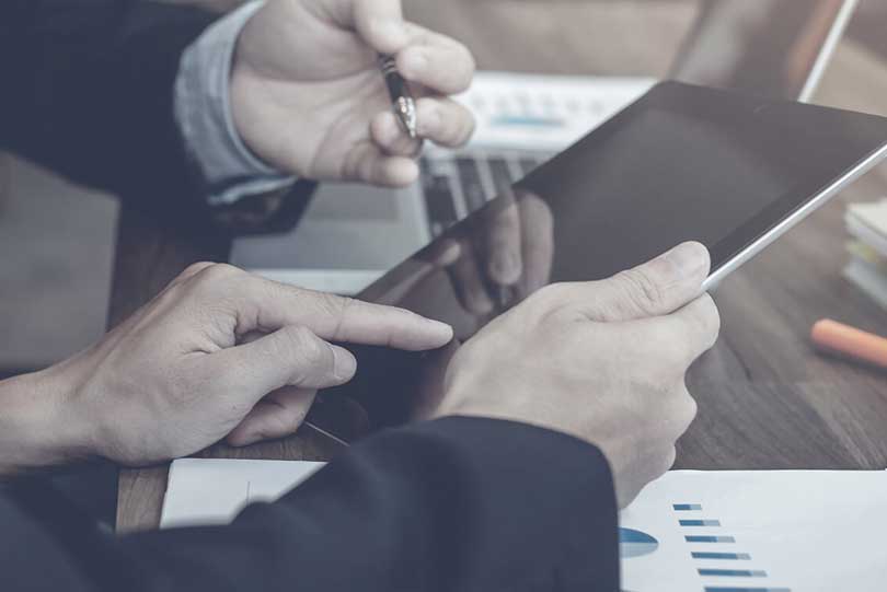 People in a meeting to discuss services for e-commerce