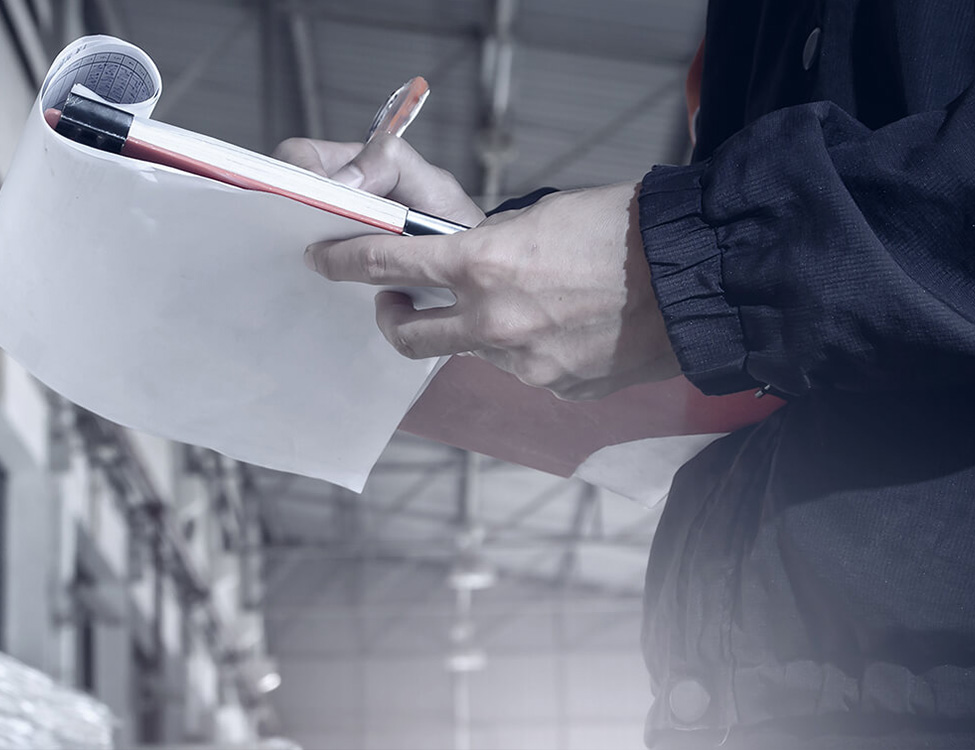 National transport worker records data on notepads