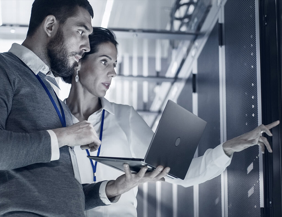 People make checks with PCs inside the Supernova startup incubator